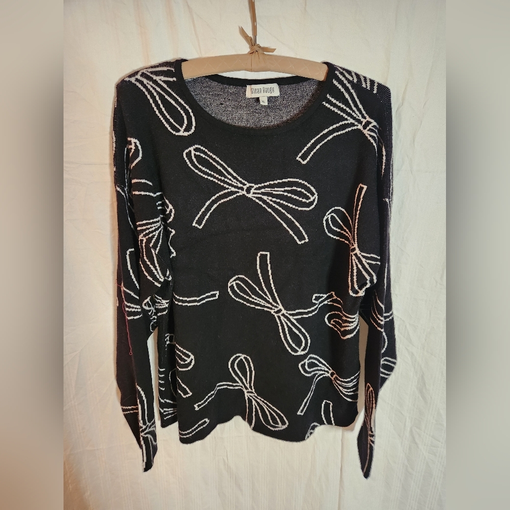Black Sweater with Bow Pattern